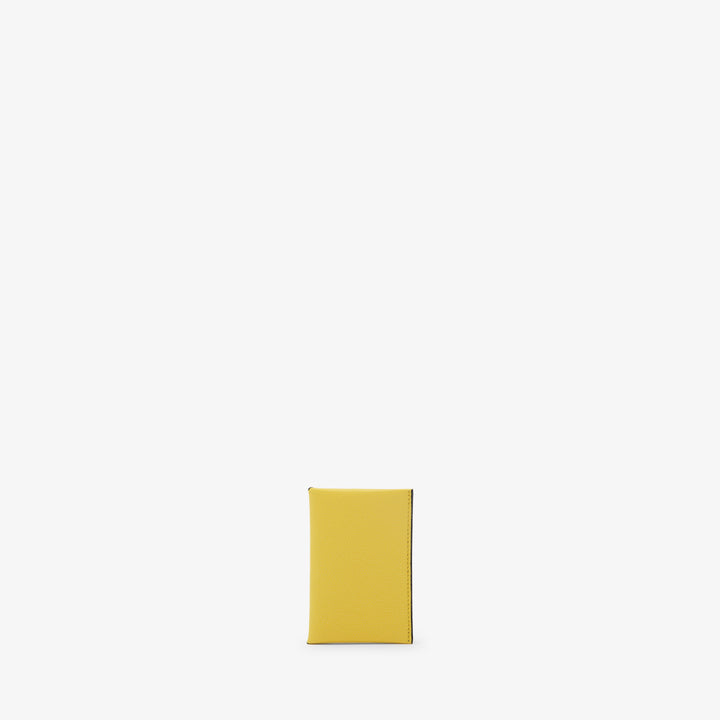 ヴァレクストラ ボタン付き カードホルダー イエロー/ブラック